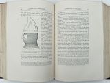 an open book with a drawing of a man ' s head on it