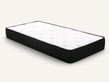 a close up of a mattress on a white surface