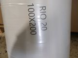 a plastic container with a plastic lid and a black sticker on it