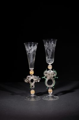 pair of cut glass goblets with dragon heads