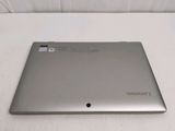 a laptop that is sitting on a white surface