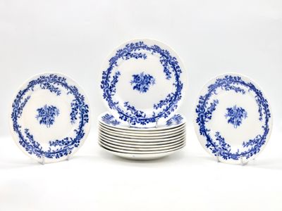 six blue and white plates stacked on top of each other