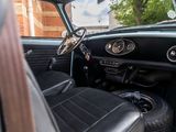 a view of the dashboard of a car from the driver ' s seat
