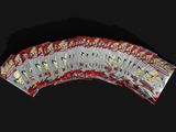a lot of playing cards on a black background