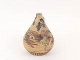 a small vase with a painting on it on a white surface