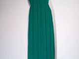green strapless dress on a mannequin mannequin mannequin mannequin mannequin mannequin mannequin mannequin manne