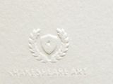 a close up of a white book with a heart on it