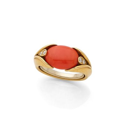 a coral and diamond ring