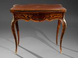 a small table with a wooden top on a grey surface