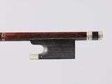 a close up of a violin bow on a white background