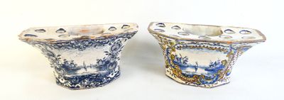 pair of blue and white vases on a white background