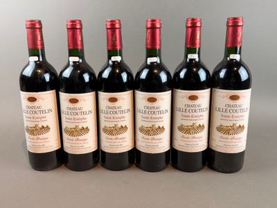 six bottles of red wine lined up in a row