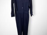 navy blue jumpsuit with buttoned front and long sleeves