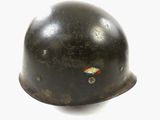 an old helmet with a red, white, and blue design on it