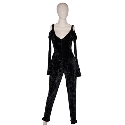 a mannequin wearing a black velvet jumpsuit on a white mannequin mannequin