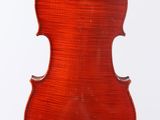 an old violin with a wooden back and a wooden bow