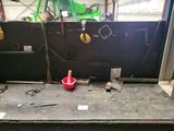 an image of a workbench with tools on it