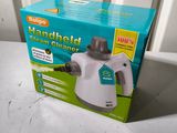 a box of hand held clean cleaner on a table