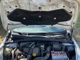 a car with its hood open and the engine in the trunk