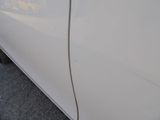 a close up of a car ' s door handle and door handle