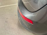 a close up of a car ' s tail lights and tail lights