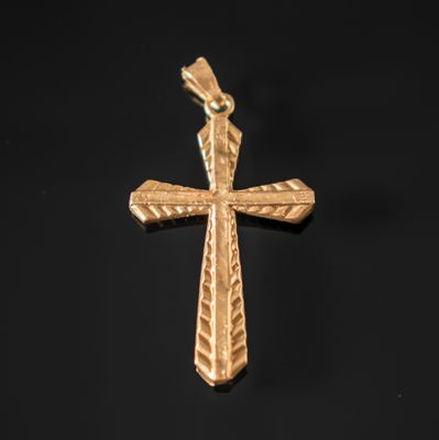 une croix dorée sur fond noir