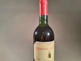 a bottle of wine that is sitting on a table