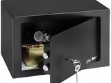 a close up of a black safe box with a key in it