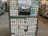 a cart with a lot of items on it in a warehouse