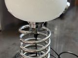 a lamp that is sitting on top of a table