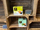 a display of teas and tea bags on the shelves