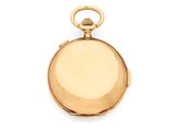 an antique gold pocket watch with a chain on a white background