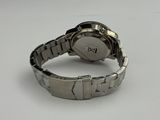 a close up of a wrist watch on a white surface