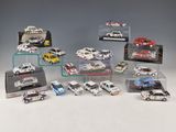 a lot of toy cars that are in a display case