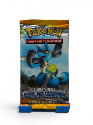 a close up of a box of pokemon cards on a white background