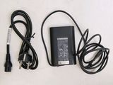 a charger and a cord on a white surface