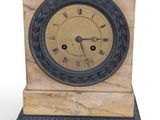 a clock that is sitting on top of a table