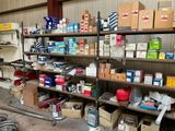 many boxes and boxes on the shelves in the garage