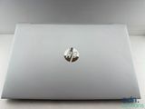 a close up of a laptop computer sitting on top of a table