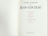 an open book with a picture of jean cocteau on it