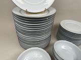a lot of plates stacked on top of each other