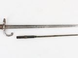 an old knife and a small knife on a white surface