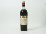 a bottle of wine that is sitting on a table