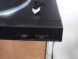 a turntable that is sitting on top of a cardboard box