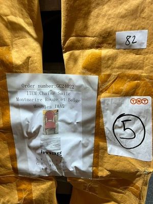 a picture of a piece of paper taped to the back of a jacket