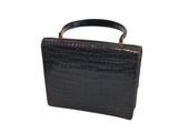 black croc embossed leather handbag with gold hardware