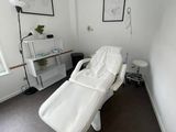 an image of a room with a bed in it