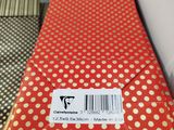 an orange and gold polka dot tie with a barcode on it