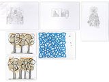 four cards with drawings of trees on them on a white surface