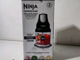 une boîte contenant un mixeur